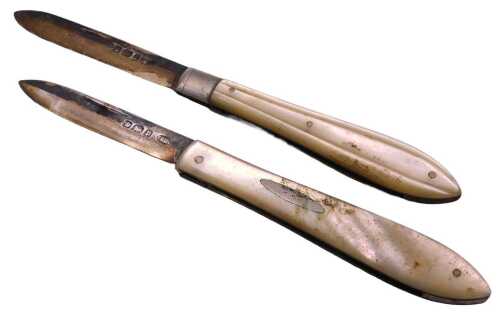 An Edward VII silver and mother of pearl bound folding pocket knife, Sheffield 1902, and a...