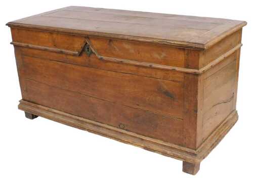 An 18thC French walnut coffer, the planked top with a moulded edge, enclosing a mainly vacant...