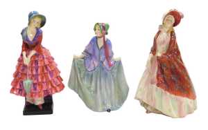Three Royal Doulton figures modelled as Sweet Anne HN1318, The Paisley Shawl HN13912, and...