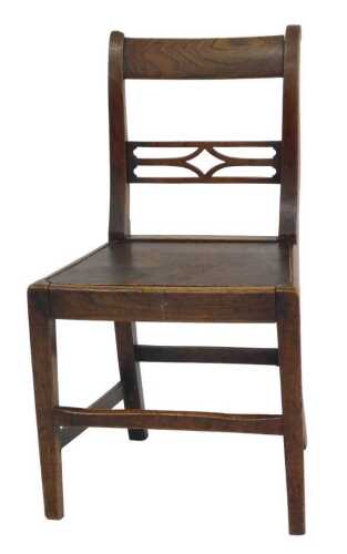A 19thC country made elm side chair, with a pierced bar back, a pine solid seat, on square...