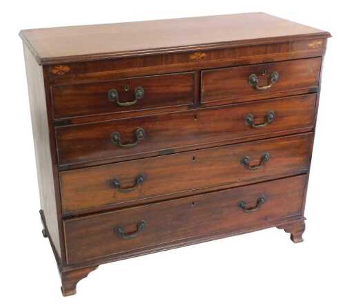 An early 19thC mahogany boxwood strung chest of drawers, the rectangular top with a crossbanded...