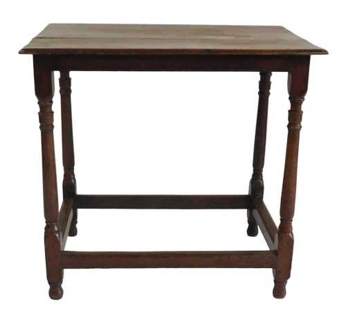 A 17thC style oak side table, raised on turned supports united by a box stretcher, 72cm high,...