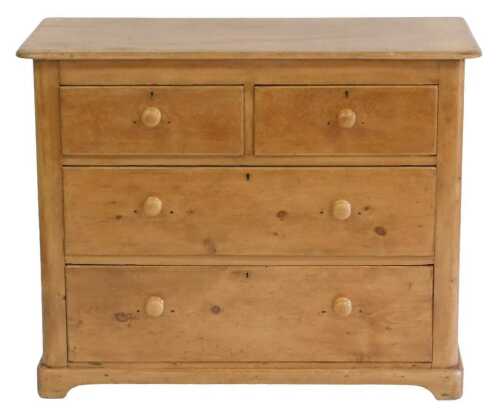 A Victorian pine chest of drawers, the rectangular top with rounded corners, above two short and...