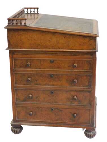 An early Victorian burr walnut Davenport, stamped M. Willson, 68 Great Queen Street, London, the...
