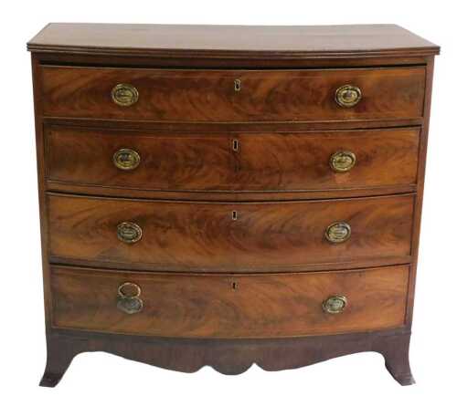 A George III mahogany bow fronted chest of drawers, the tulipwood crossbanded top above four...