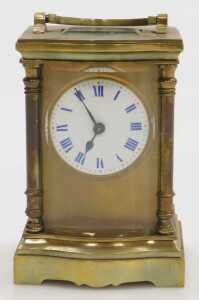 A late 19thC serpentine fronted brass cased carriage clock, circular enamel dial with blue Roman... - 2