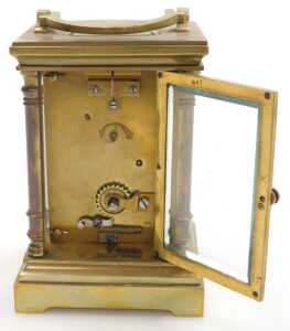 A late 19thC serpentine fronted brass cased carriage clock, circular enamel dial with blue Roman... - 5