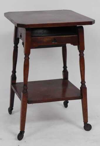 A Victorian mahogany metamorphic child's chair, converting to a table, the hinged, canted...