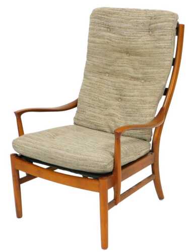 A late 20thC Parker Knoll Florian Range teak framed armchair, with oatmeal striped button fabric,...