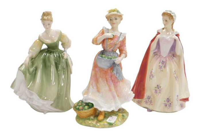 Three Royal Doulton figures, modelled as Country Love 2418, Fair Lady HN2193 and Bess HN2002.
