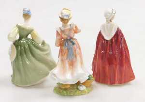 Three Royal Doulton figures, modelled as Country Love 2418, Fair Lady HN2193 and Bess HN2002. - 2