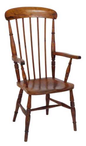 A late 19thC country made beech and elm stickback armchair, with solid seat and turned legs.
