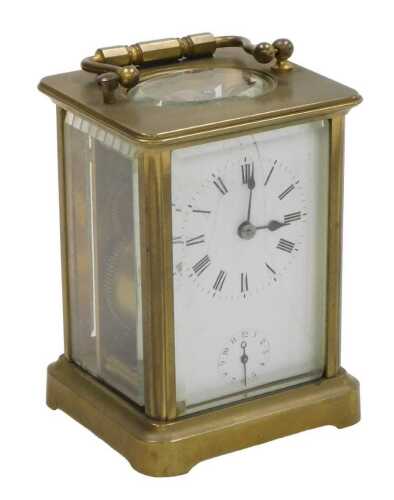 A late 19thC brass alarm carriage clock, rectangular fascia with circular enamel dial bearing...