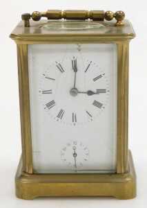 A late 19thC brass alarm carriage clock, rectangular fascia with circular enamel dial bearing... - 2