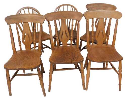 A set of four 19thC beech and elm kitchen chairs, each with a pierced splat, on turned legs,...
