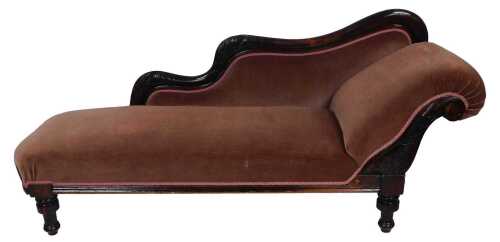 A late Victorian stained beech chaise longue, upholstered in pink fabric, on turned legs, 187cm...