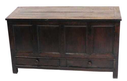 A late 17th/early 18thC oak mule chest, the planked top enclosing a vacant interior, the...