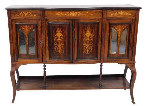 An Edwardian rosewood and marquetry side cabinet, the top with a moulded edge, above two doors...
