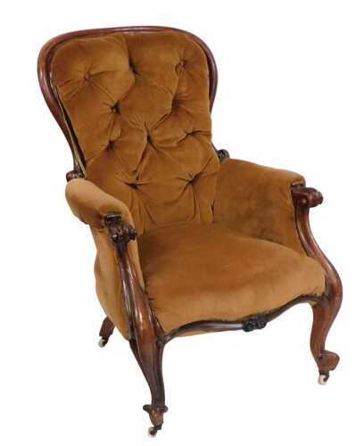 A Victorian mahogany show frame chair, upholstered in brown fabric, on cabriole legs with...