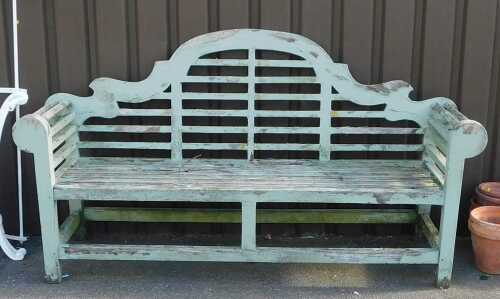 A Lutyens style hardwood bench, later painted pale green, 204cm wide. (AF)