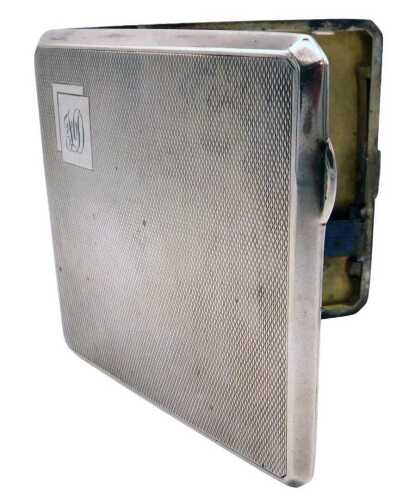 A George VI silver cigarette case, with engine turned decoration, reserve monogram engraved,...