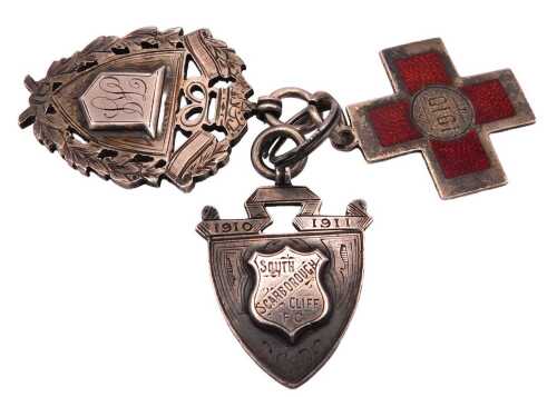 Two silver shield shaped medals, one monogram engraved, verso 222 (Bde F.L. Winners 1917-18), 18....