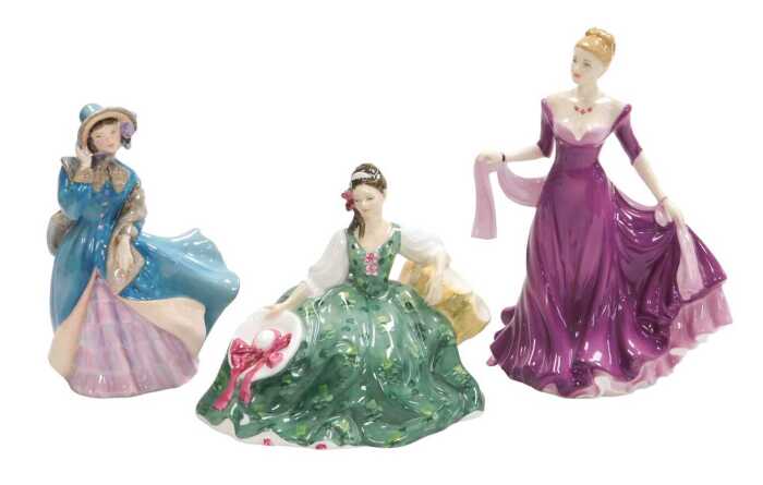 Three Royal Doulton figures, modelled as Ellie HN4017, Elyse HN2474, and Delphine HN2136.
