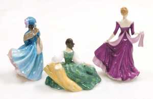Three Royal Doulton figures, modelled as Ellie HN4017, Elyse HN2474, and Delphine HN2136. - 2