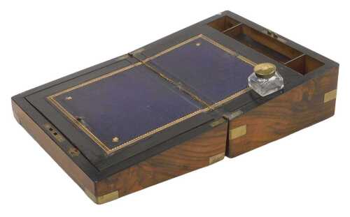 A Victorian walnut and brass bound writing slope, the interior with blue leather insert and an...