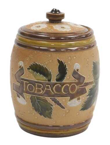 A Doulton Lambeth Slater's Patent tobacco jar, decorated with flowers, 13cm high. (AF)
