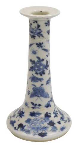 A 19thC Chinese porcelain candlestick, decorated with birds and flowers, in blue, 19cm high.