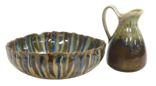 A studio pottery bowl, incised M, 24.5cm diameter, and a ceramic jug. (2)