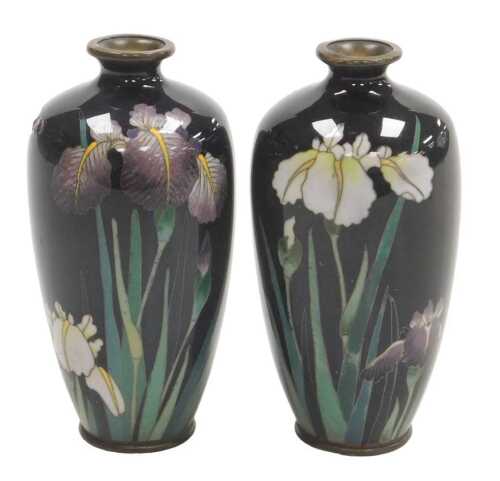 A pair of Japanese cloisonne vases, each decorated with irises on a black ground, 12cm high. (AF)
