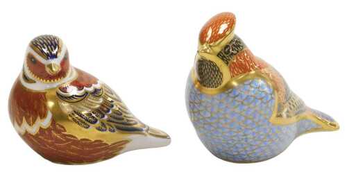 A Royal Crown Derby Imari porcelain waxwing, gold button, and a chaffinch paperweight. (2)