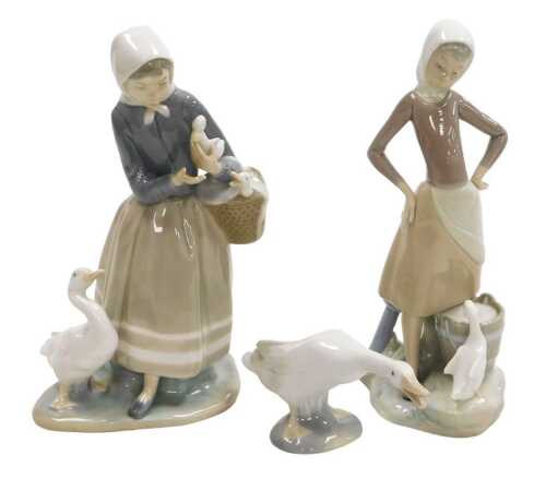 Two Lladro porcelain figure groups, each with a female figure with geese, 23cm and 24cm high,...
