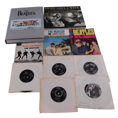 Various Beatles books and ephemera, to include Beatles in America programme, Beatles singles to...