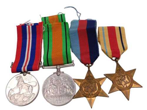A group of four World War II medals, address boxed to Mr R Roberts, Stoke on Trent, comprising...