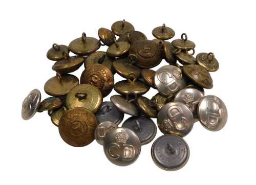 Assorted Worcestershire Regiment brass buttons, together with Civil Defence buttons.