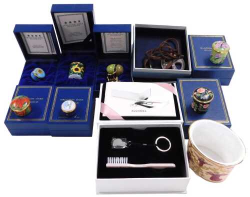 Seven Halcyon Days enamel boxes, an acorn on stand, all boxed, together with a Halcyon Days oval...