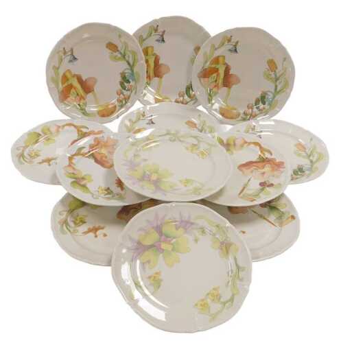 Twelve Langenthal porcelain plates, designed by Oskar Weiss, in three designs, each decorated...