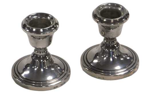 A pair of Elizabeth II loaded squat silver candlesticks, Birmingham 1974, 3.67oz all in, 6cm high.