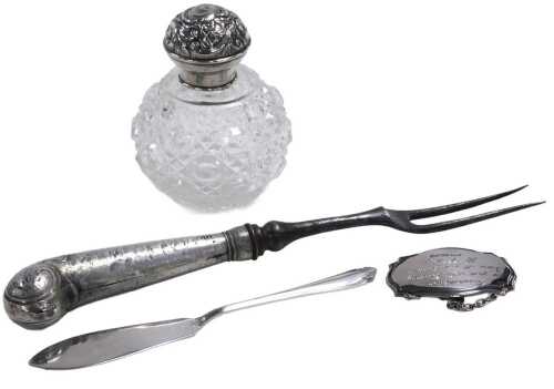 An Edward VII cut glass and silver lidded scent bottle, embossed with flowers and scrolling...
