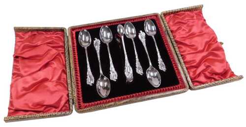 A set of six late 19thC silver plated coffee spoons, and matching sugar tongs, by Walker and...