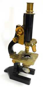 A late 19thC brass and black Japanned monocular compound microscope, with additional lenses, cased. - 2