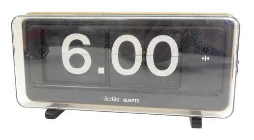 V - An Acctim quartz electric clock, model Q92/546, 29cm wide. (AF) Note: VAT is payable on the...