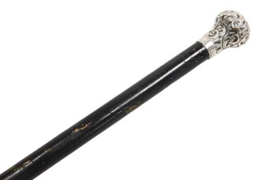 An Edward VII ebonised and silver mounted walking cane, embossed with foliate scrolls, vacant...