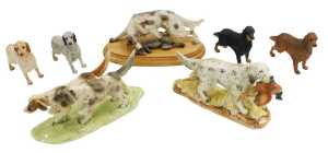 A group of porcelain and resin figures of setters, including Norcrest. (7)
