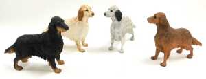 A group of porcelain and resin figures of setters, including Norcrest. (7) - 5