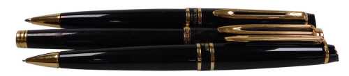 A Waterman black cased fountain pen, with an 18ct gold nib, together with a ballpoint pen, and a...