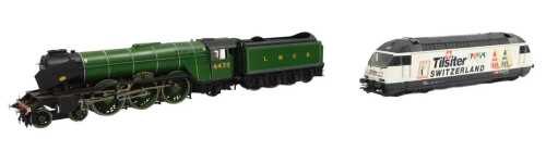 A Marklin Swiss OO gauge locomotive, for the brand Tilsiter Cheese, and a Hornby Flying Scotsman...